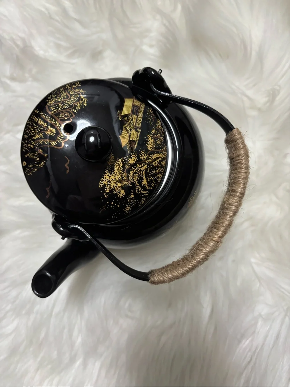 Black and Gold Ceramic Teapot with Woven Handle